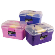 Three grooming kits in purple, pink, and blue with clear lids on a white background.